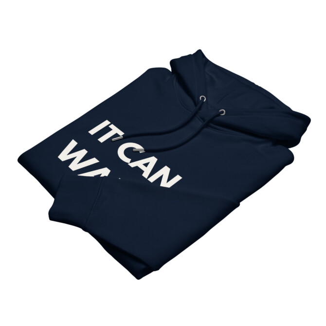Folded navy blue 'It Can Wait' hoodie, highlighting its soft, plush fabric
